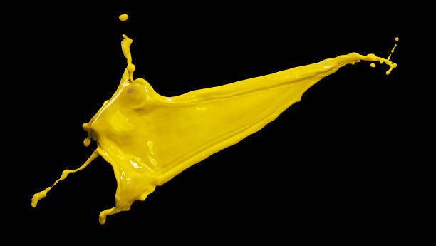istock splendid yellow paint splash isolated on black background 1216537721