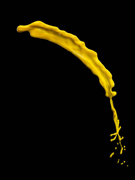 istock splendid yellow paint splash isolated on black background 1216537751