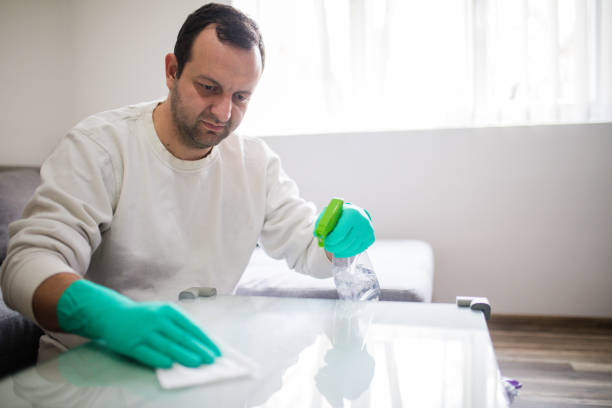 istock Deep cleaning for Covid-19 disease Alcohol, disinfectant spray on table. 1216537776