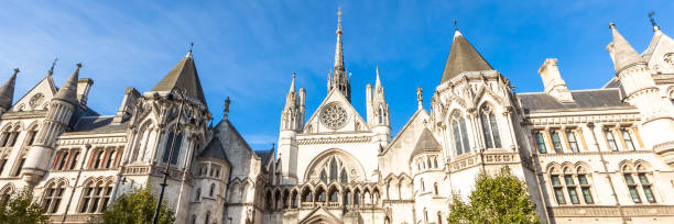 royal courts of justice in london england - royal courts of justice stock-fotos und bilder