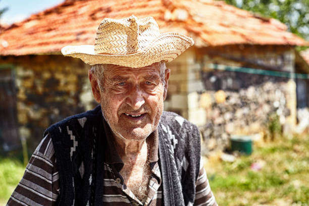 istock Mediterranean old farmer is enjoying the beautiful sunny day 1216539230