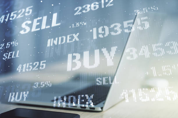 istock Abstract creative financial graph on modern laptop background, financial and trading concept. Multiexposure 1216541003