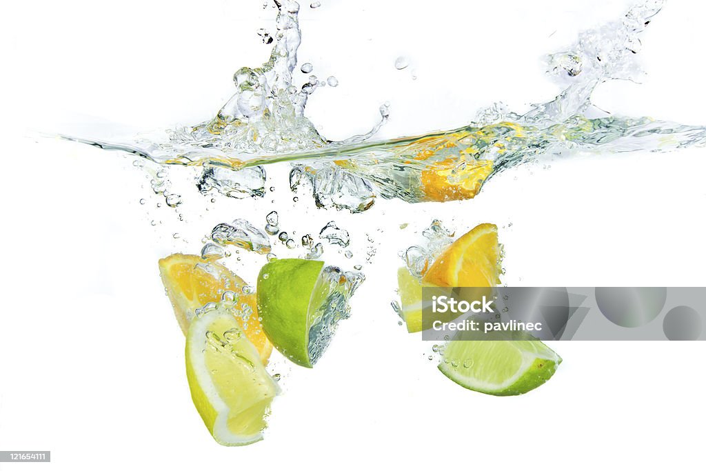 Salpicaduras de frutas cítricas - Foto de stock de Agua libre de derechos