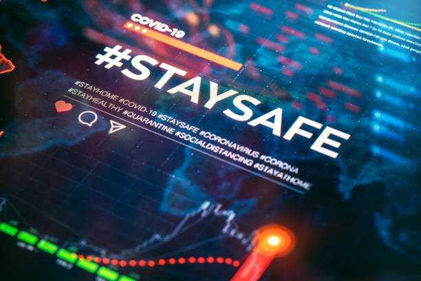 istock #staysafe. Stay safe hashtag close-up on digital display 1216541135