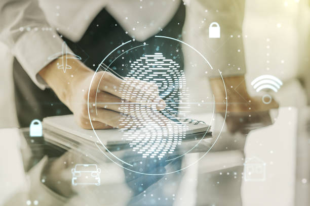 istock Double exposure of abstract creative fingerprint hologram with man hand writing in notepad on background, protection of personal information concept 1216542093