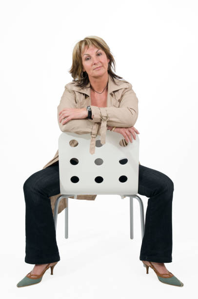 straddling on the chair