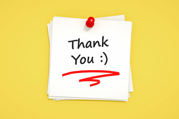 istock Thank You Message on White Adhesive Sticky Note 1216542828