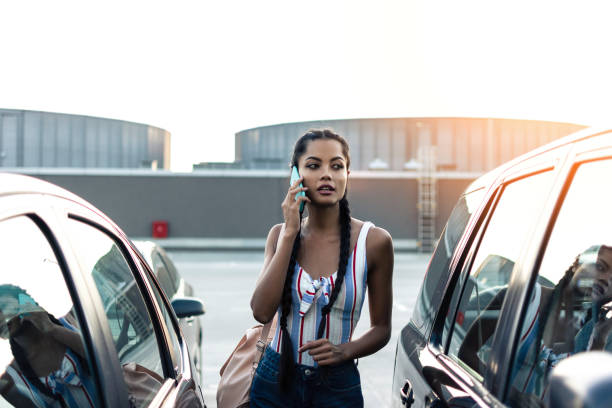 istock Pretty woman talking on her phone 1216543685