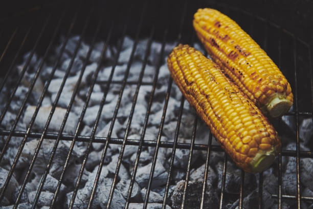 istock Close-Up Of Corn On Barbecue Grill 1216549028