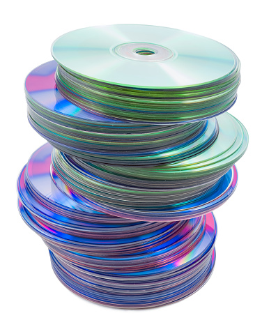 heap of compact disk on a white background