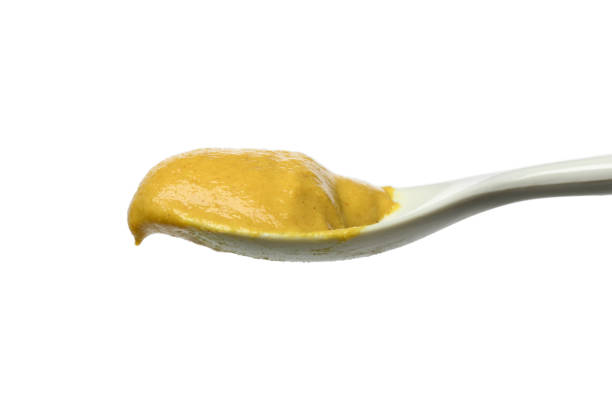 istock Spoonful with Dijon Mustard 1216550684