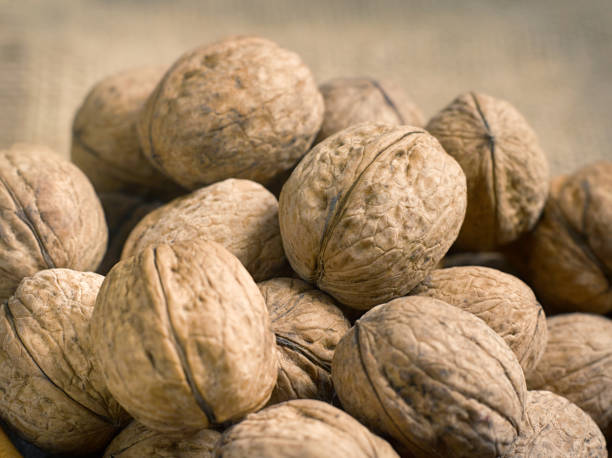 istock Closeup of nuts on a table 1216550991