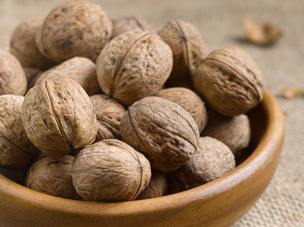 istock Closeup of nuts on a table 1216551303