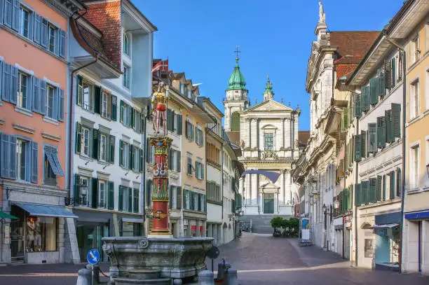 Street with fountain and Cathedral in Solothurn, Switzerland