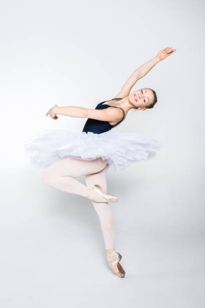 istock Young ballerina practising ballet moves 1216552923