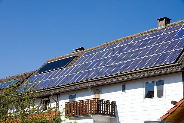istock House with solar cells on the roof 121655346