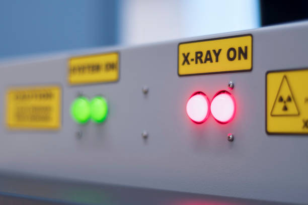 Security X-ray Machine Red Emergency Stop and Green System On Lights On at Checkpoint
