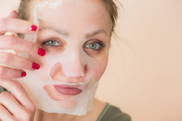 istock Cosmetic face mask and girl 1216557039