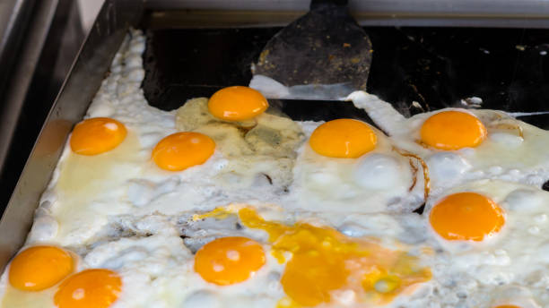 istock Eggs are fried, look from above, a natural quick breakfast of fresh eggs. Fast food with egg products. 1216557629
