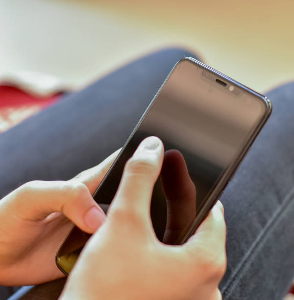 istock Close up of a woman using smart phone 1216558853