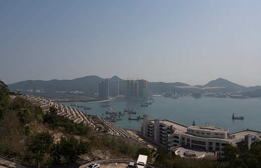 February 22, 2020, Hong Kong: A panoramic view of marine works of Cross Bay Link at Tseung Kwan O and Tseung Kwan O Chinese Permanent Cemetery in Hong Kong is seen. The Link is a bridge connecting LOHAS Park area with the Tseung Kwan O-Lam Tin Tunnel.