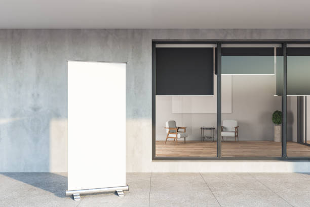 istock Apartament house with gray facade and blank billboard 1216560264