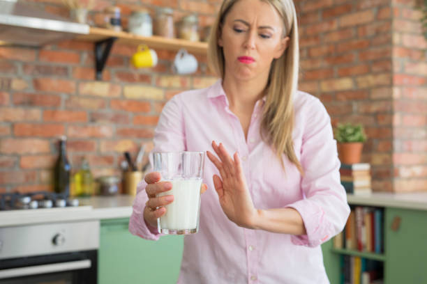 istock Woman having lactose intolerance 1216560615