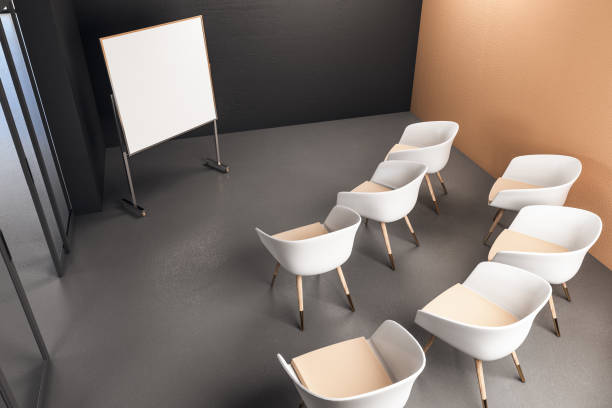 istock Presentation room with blank banner 1216562259