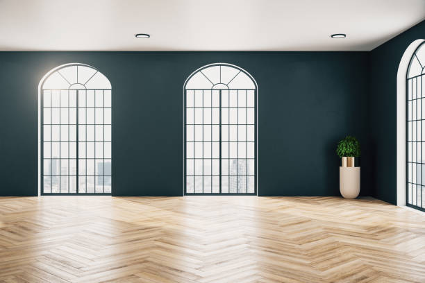 istock Modern gallery interior with wooden floor and plant 1216563274