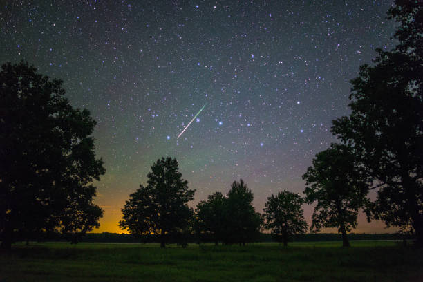 Bright meteor Bright meteor from Perseids meteor shower meteor shower stock pictures, royalty-free photos & images