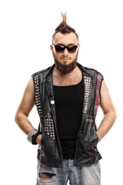 Young punk with a mohawk hair style and sunglasses Young punk with a mohawk hair style and sunglasses isolated on white background mohawk stock pictures, royalty-free photos & images