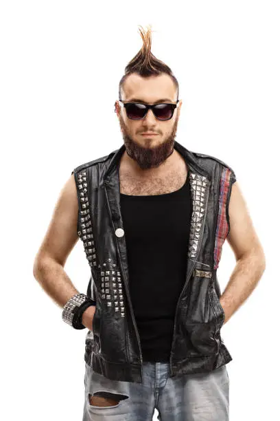 Young punk with a mohawk hair style and sunglasses isolated on white background