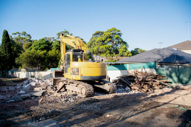 istock Excavator working on demolition of the resedential building. Debris on the construction site 1216565816