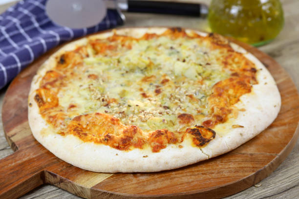 istock gorgonzola and hazelnut pizza on a cutting board 1216566122