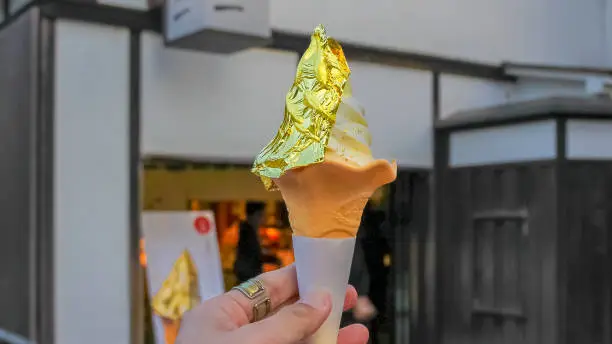 Close up of Japanese gold leaf wrapped ice-cream. It is a famous product of Kanazawa in Japan.