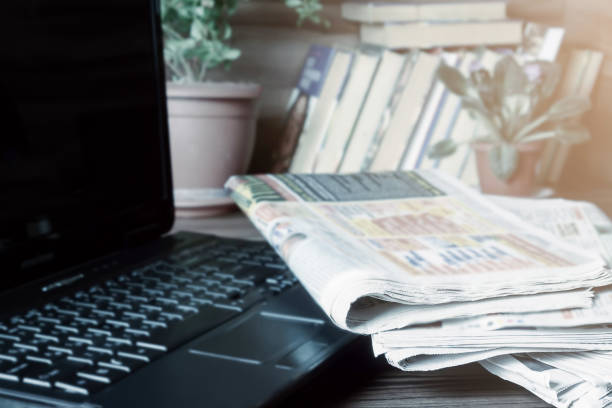 istock Media concept. Newspapers on the coffee table. 1216567366