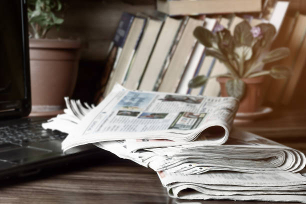 istock Media concept. Newspapers on the coffee table. 1216567367