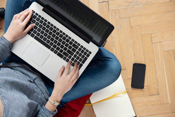 istock friendly workspace - girl working from home 1216569048