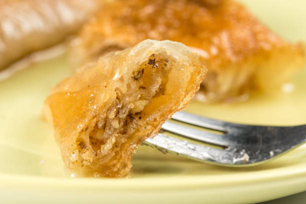 istock Traditional Turkey baklava pie with walnuts closeup macro 1216570004