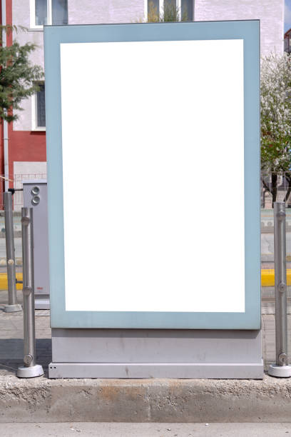 istock Blank white horizontal mock up of information banner with empty place for text on tram stop in the street 1216571680