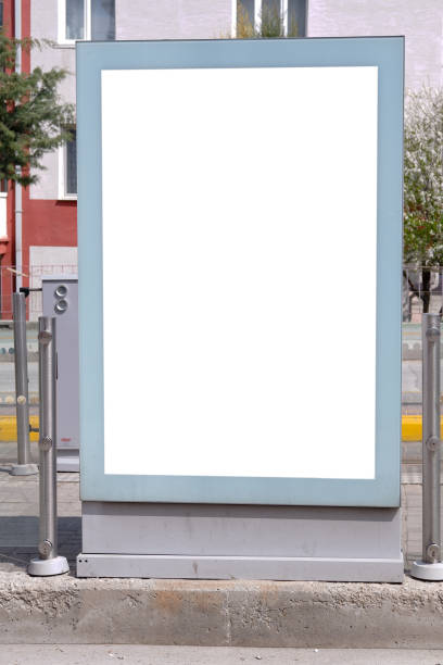 istock Blank white horizontal mock up of information banner with empty place for text on tram stop in the street 1216571761