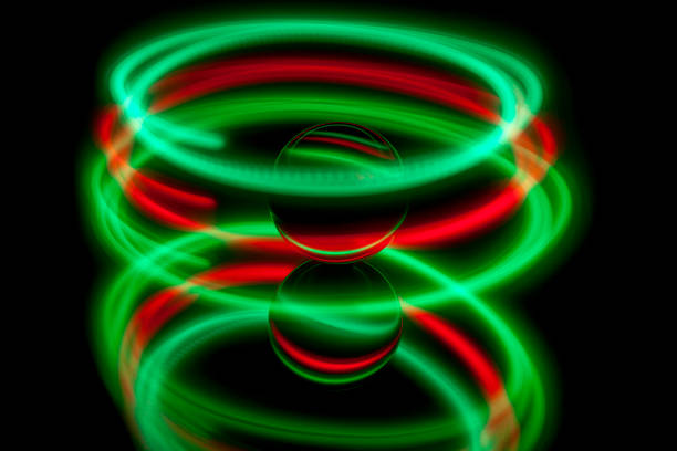 istock Light painting around a glass ball 1216571853