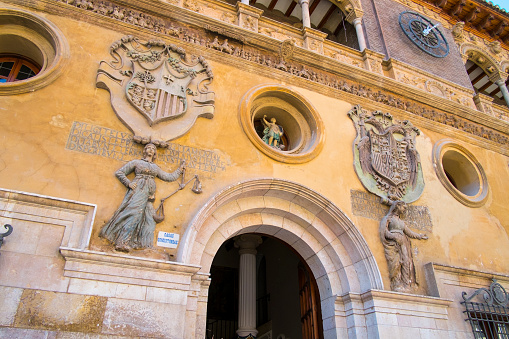 Detail of the facade of the Tarazona City Council (Zaragoza). The building was built between 1557 and 1563 in the Plaza Mayor or Mercado, to fulfill the role of Lonja. The building, supported on the back by the ashlars of the wall, was originally exempt, but today it is located between party walls. In the middle of the 17th century this building began to be used as a town hall. At present it is considered Cultural Property of Aragon.