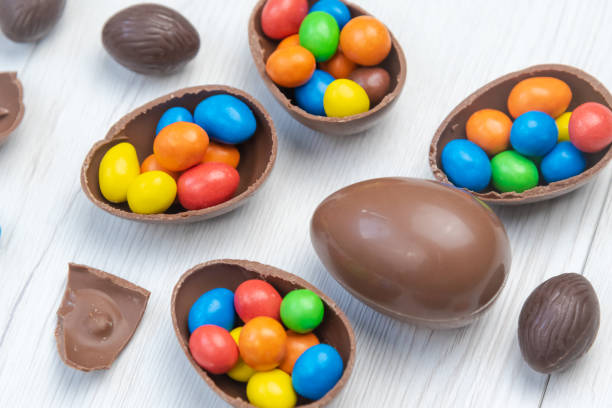 istock Chocolate Easter eggs and chocolate eggs filled with sweet and colorful candies 1216574366