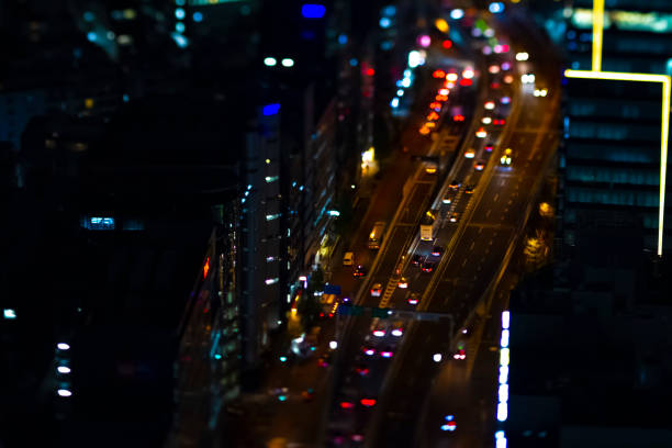 A night miniature highway at the urban city in Tokyo high angle tiltshit A night miniature highway at the urban city high angle tiltshit. Shibuya district Shibuya Tokyo / Japan - 12.03.2019 diorama photos stock pictures, royalty-free photos & images