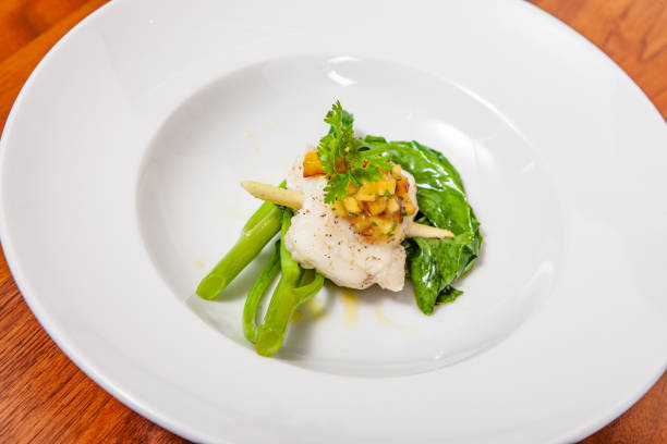 istock lifestyle cook presenting food in a plate 1216577109