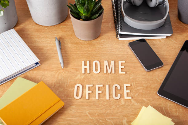 istock home office text desk with tablet computer smartphone notebook houseplants, working space at home 1216578204