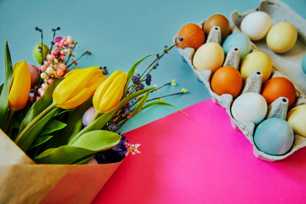 istock Bunch of yellow tulip flowers and Easter eggs. Happy Easter. Spring concept. 1216578438