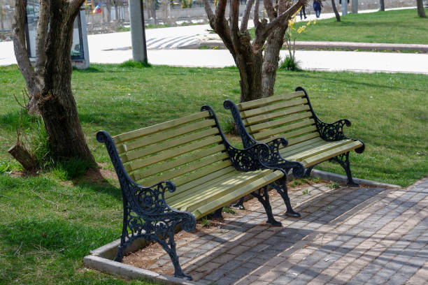 istock Empty benches at public park during an outbreak of coronavirus. 1216580806