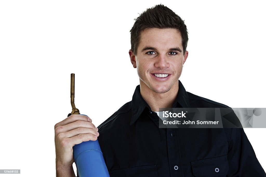 Réparateur tenant une torche - Photo de 20-24 ans libre de droits